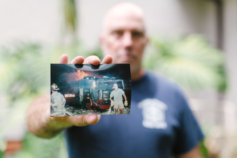 Dan shares a photo of himself working at Ground Zero. He arrived to the scene on his day off, wearing a t-shirt and shorts