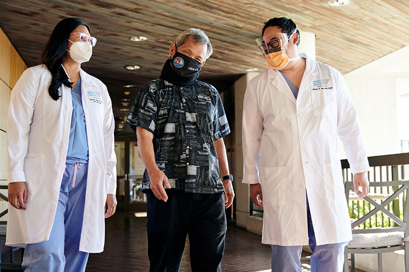 Glenn Tango (center) with Dr. Maria Ver, Pali Momi Trauma Program medical director, and Dr. Richard Inae, Pali Momi surgeon