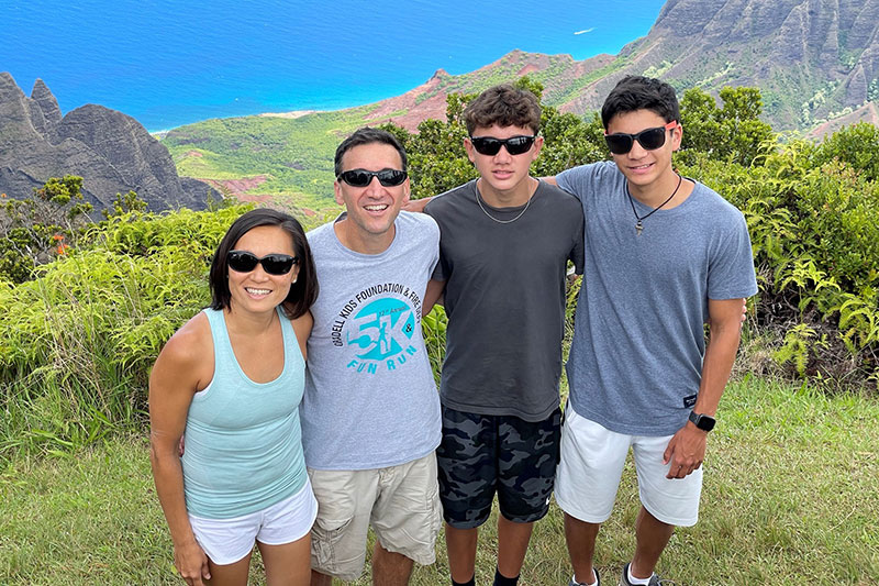 Dr. Dee Dee Wu, husband Brian, and sons Justin and Jacob at Waimea Canyon State Park after her lifesaving care at Wilcox
