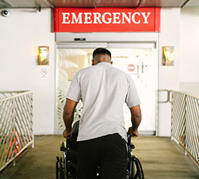 Patient being wheeled into the Emergency Department.